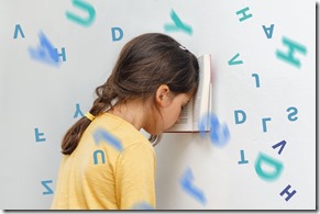 Sad and tired caucasian girl with dyslexia holds a book on her forehead. Flying tangled letters in the air. The child learns to speak and read correctly