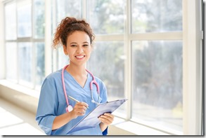 Young African-American nurse in clinic