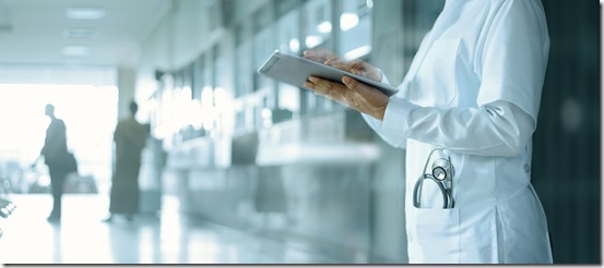 Healthcare and medicine. Medical and technology. Doctor working on digital tablet on hospital background